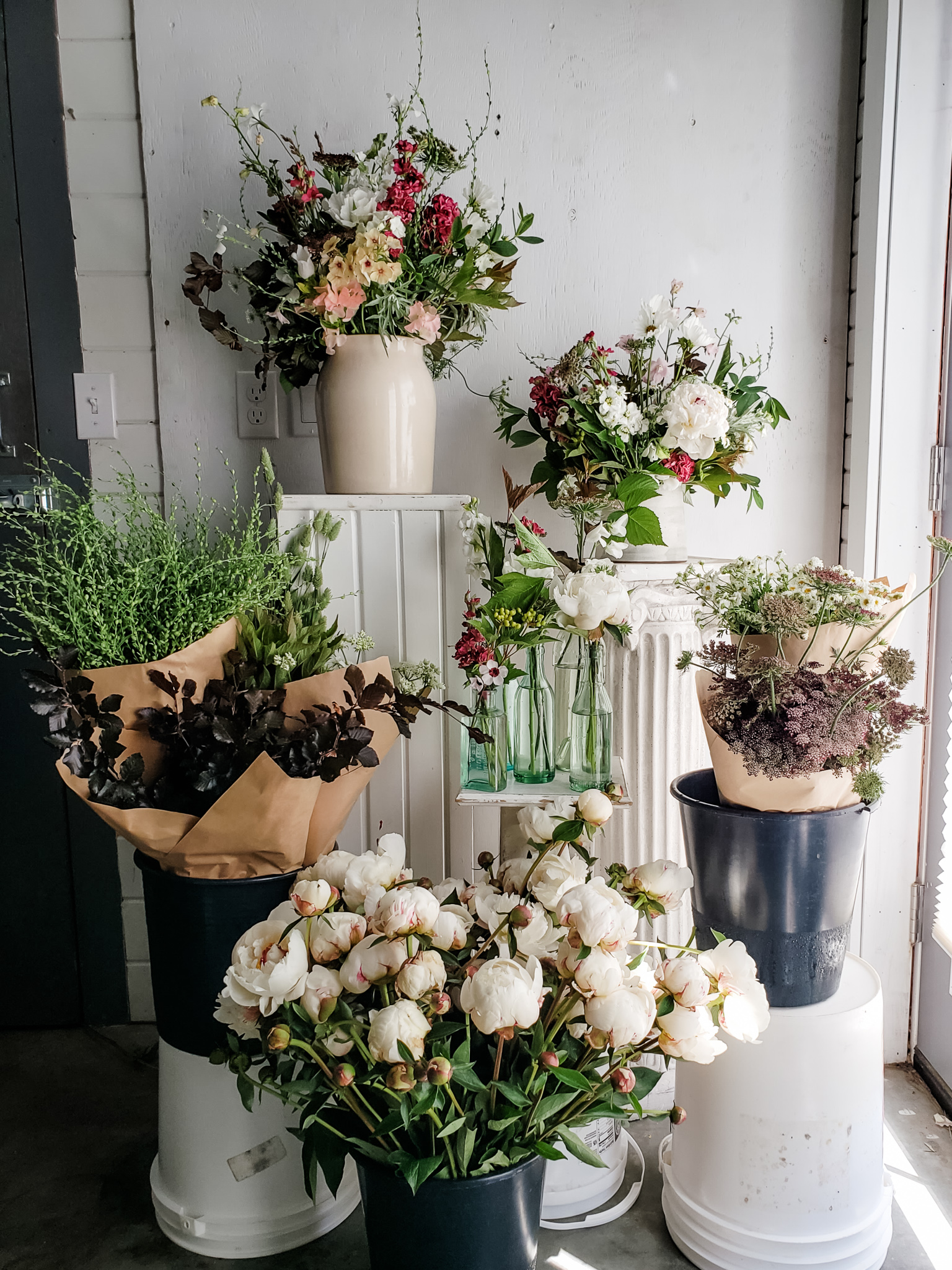 An al a Carte wedding package of pink and white country flowers with some designed bouquets and DIY flowers.