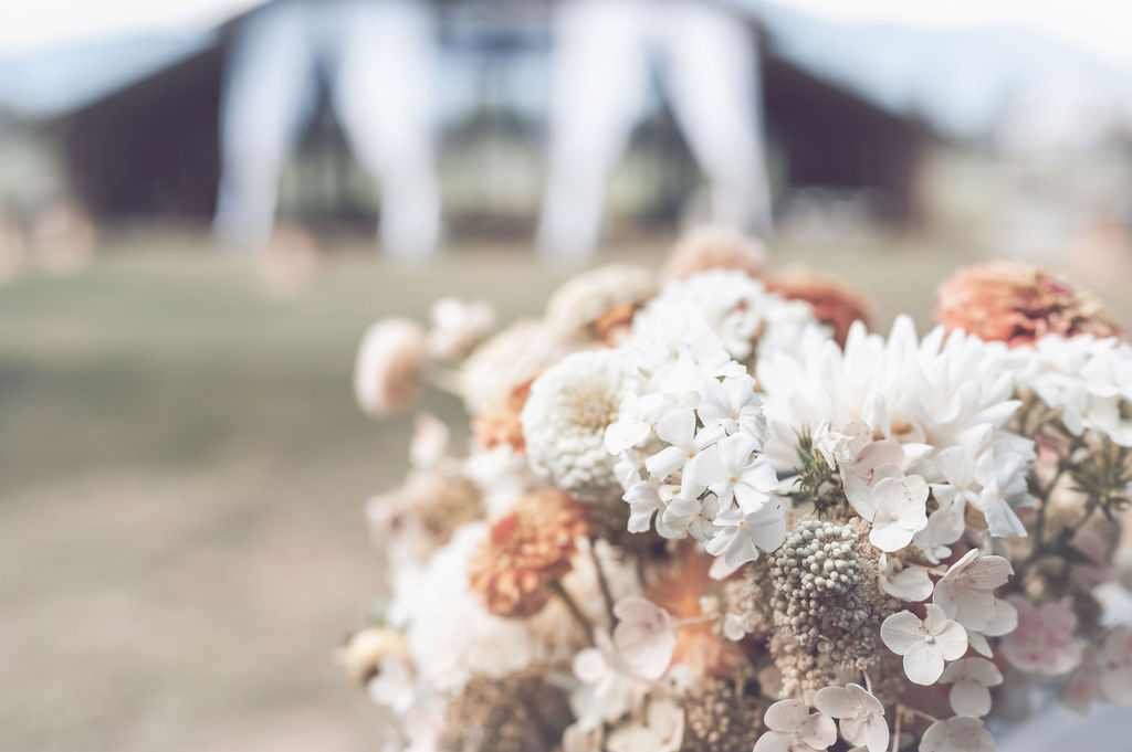 Peach bridal bouquet of ordered wedding flowers.